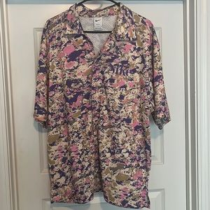 Purple, pink, and camouflage Nike button down shirt Large.